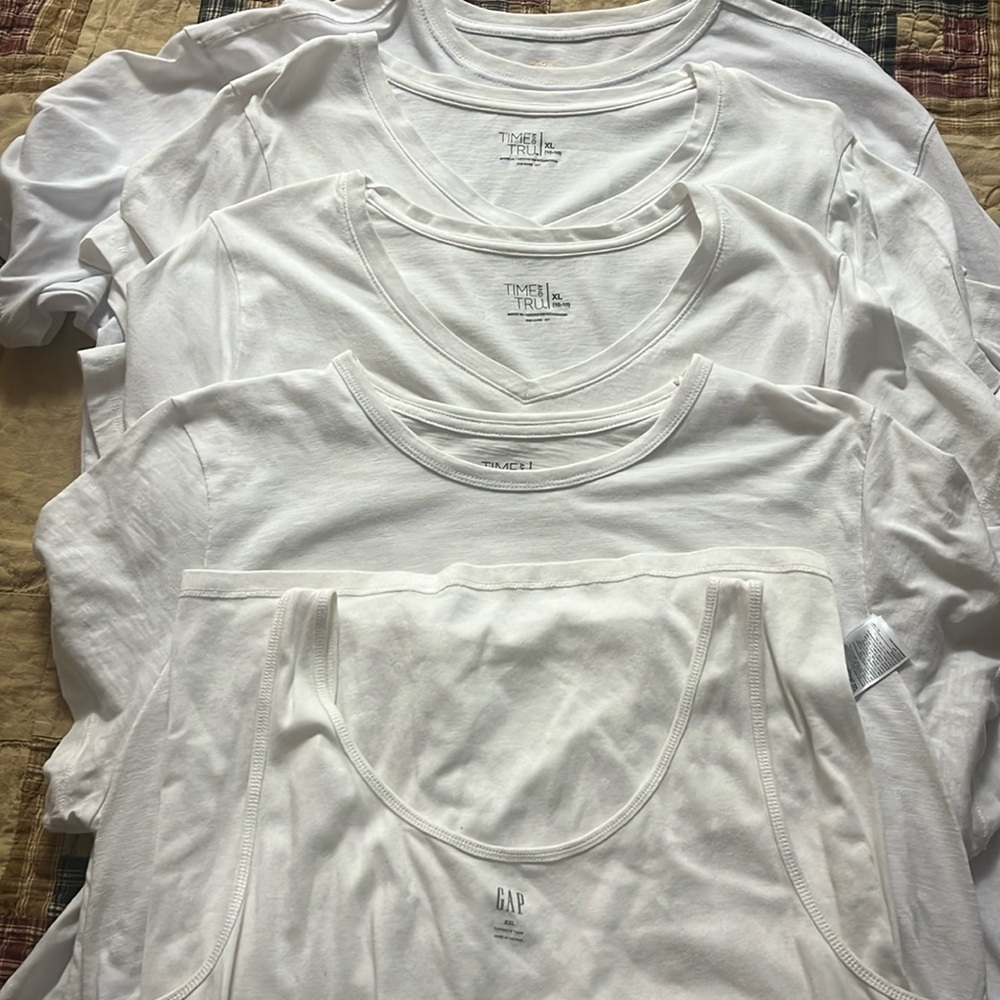 Lot of white tshirts.